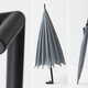 Illustration for article titled A Clever Standing Umbrella Drips Dry On Its Own Two Feet